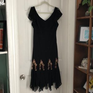 Fluttery black dress with great details